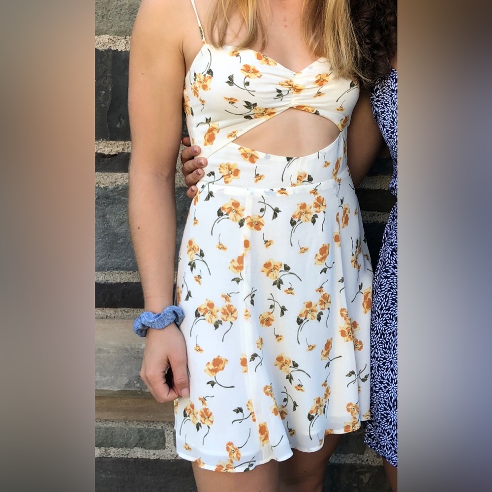 Reformation mini dress with front cutout in Limonada Ivory Floral Print (size 2)